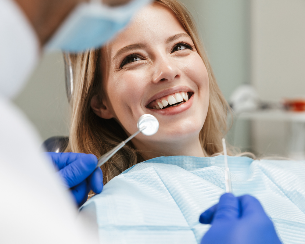 A female patient smiling while Dental Check-up